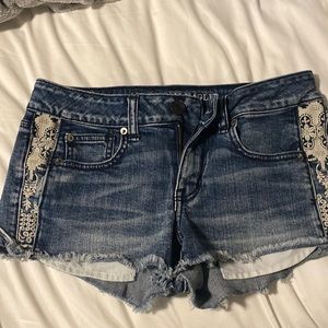 American eagle denim shorts with side detail.